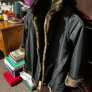 This beautiful Neiman Marcus fake Fur special coat for that precious someone